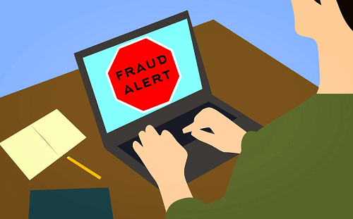 romance scams fraud alert on laptop